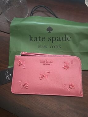 kate spade pink floral embossed zip clutch